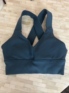 ALO Yoga Women's Cross-Back Ribbed Sports Bra in Blue
